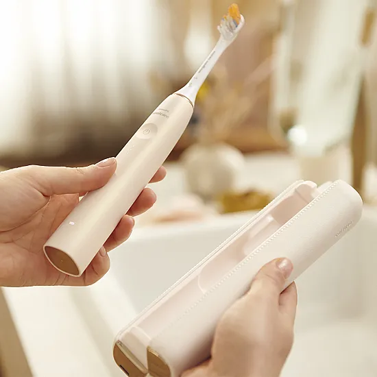 Електрическа четка за зъби Prestige 9900 SenseIQ, цвят шампанско Philips Sonicare Звукова четка за зъби Prestige 9900 SenseIQ, шампанско HX9992/11