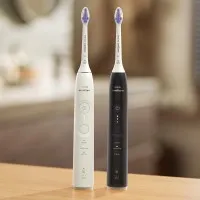 Philips Sonicare series 6500 Електрически звукови четки за зъби HX7419/01 бяла и черна с калъф Philips Sonicare комплект четки за зъби HX7419/01 серия 6500, бяла и черна с калъфи